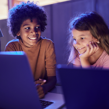 students looking at computers